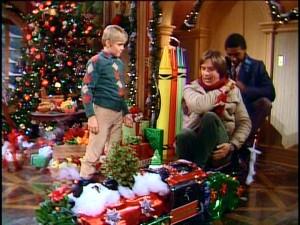 "I can't chat now, son, I've gotta deliver these gifts to the kitchen!"