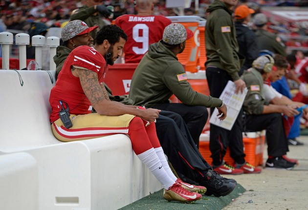 San Francisco 49ers quarterback Colin Kaepernick (7) sits on the bench while playing the Atlanta Falcons in the fourth quarter of their NFL game at Levi's Stadium in Santa Clara, Calif., on Sunday, Nov. 8, 2015. San Francisco defeated Atlanta 17-16. (Jose Carlos Fajardo/Bay Area News Group)